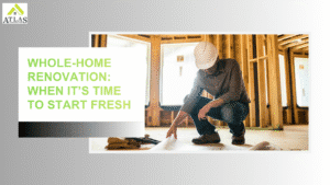 Contractor drilling glass windows while working on a home renovation project